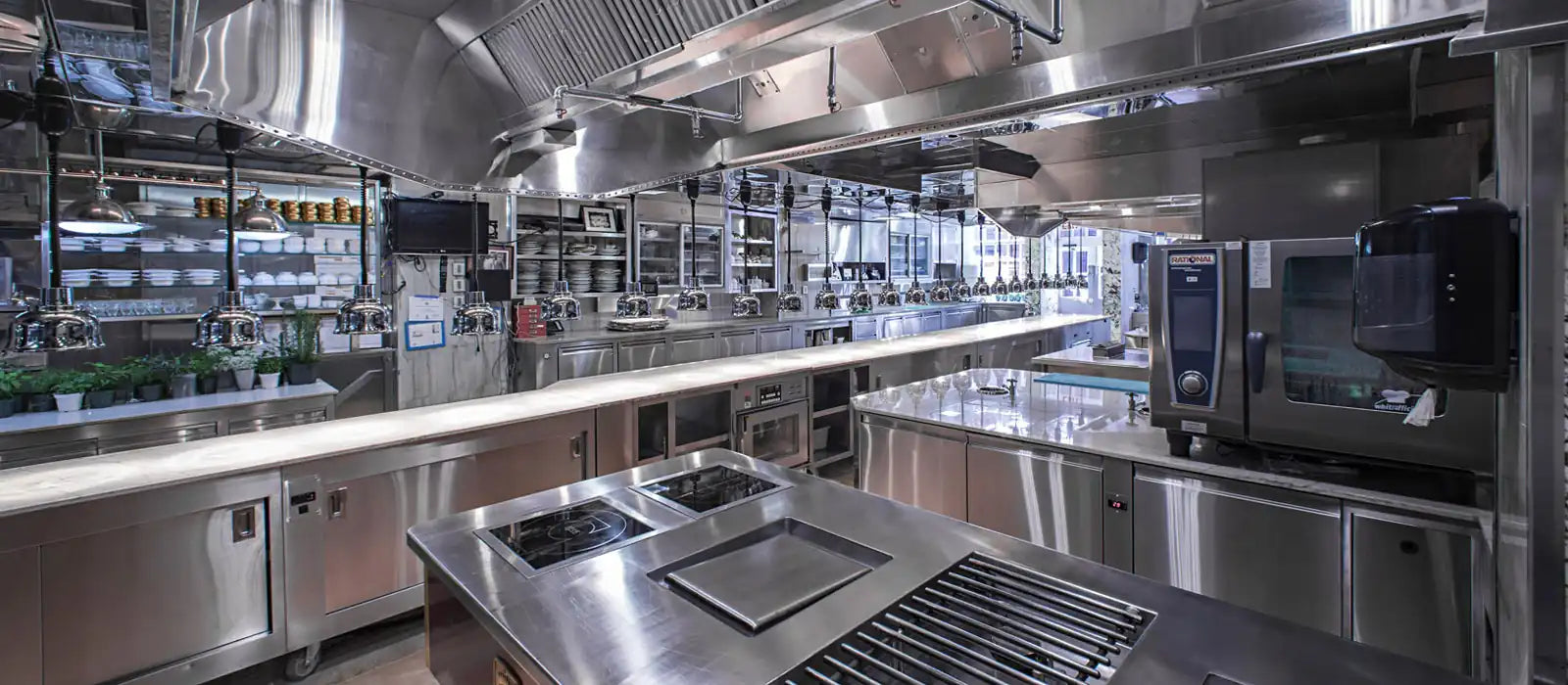 Fully equipped stainless steel commercial kitchen with cooking line, refrigeration and Rational oven installed in North East Victoria by Northeast Catering Equipment